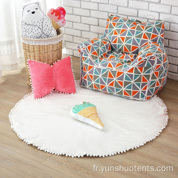 Tapis de sol rond en coton pour enfants avec pompon